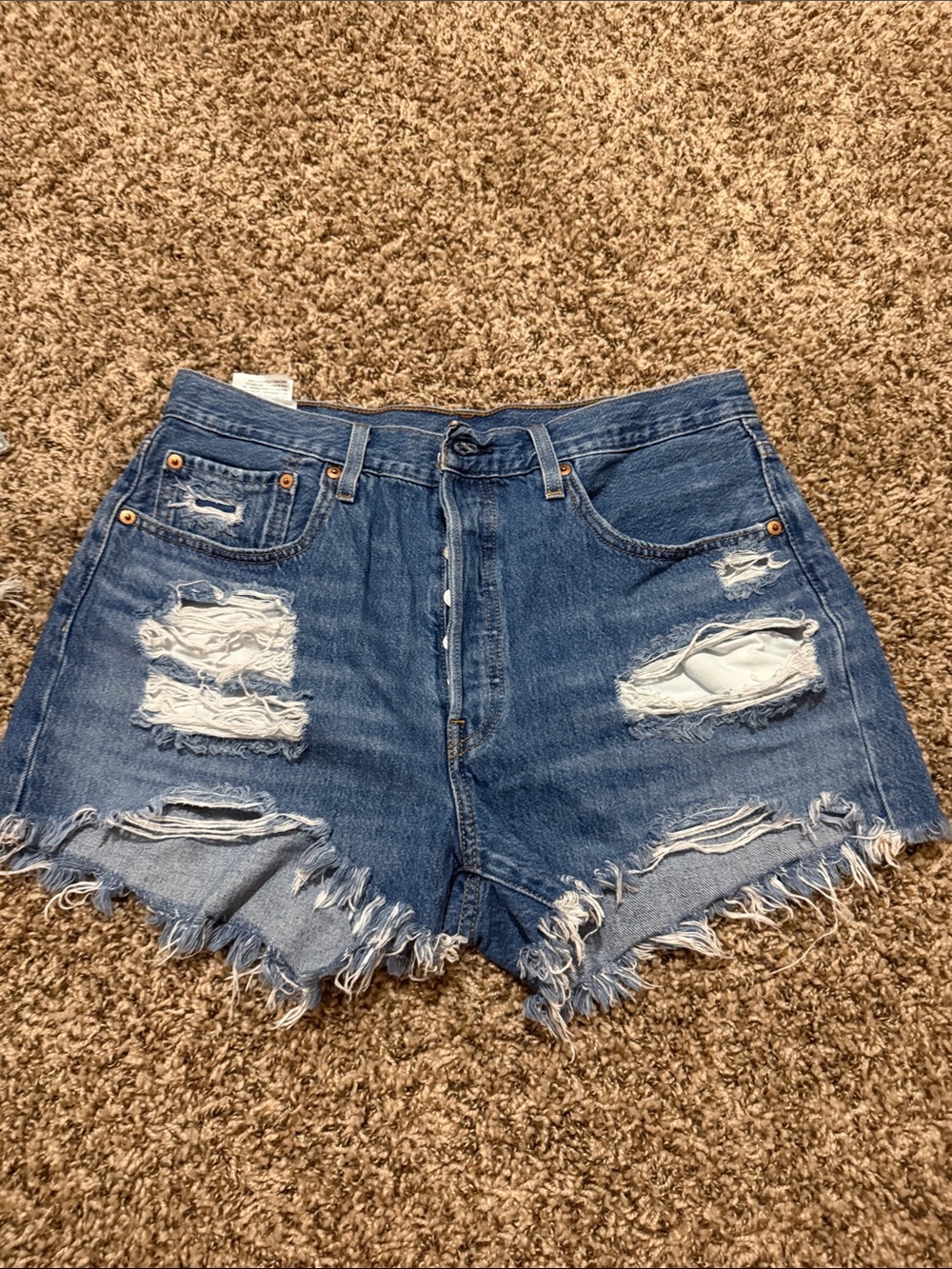 Distressed Levi’s blue 501 shorts